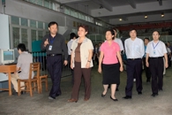 自治区副主席李康在区教育厅厅长高枫、副市长文和群陪同下到我院视察